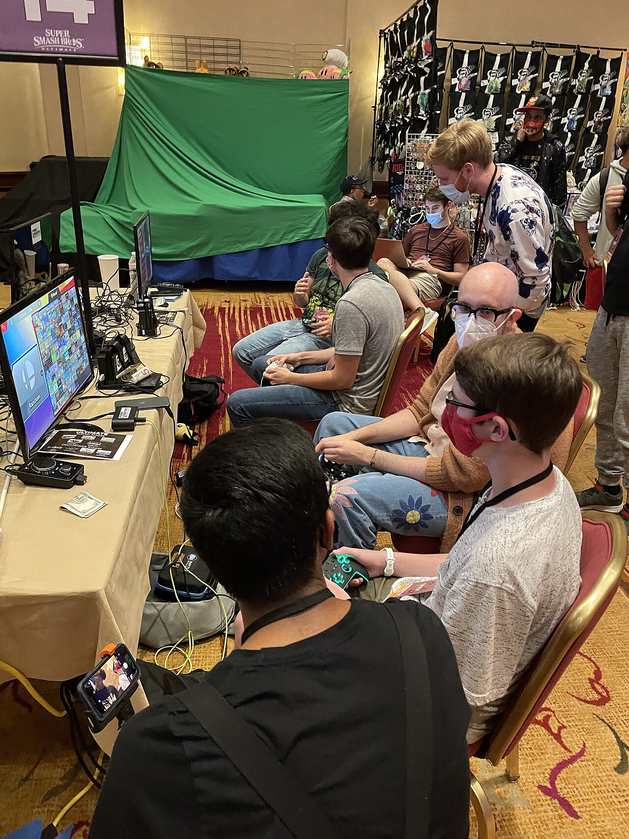 Illustrative people participating in console gaming photo; not a photo of New Game Plus Gaming Center