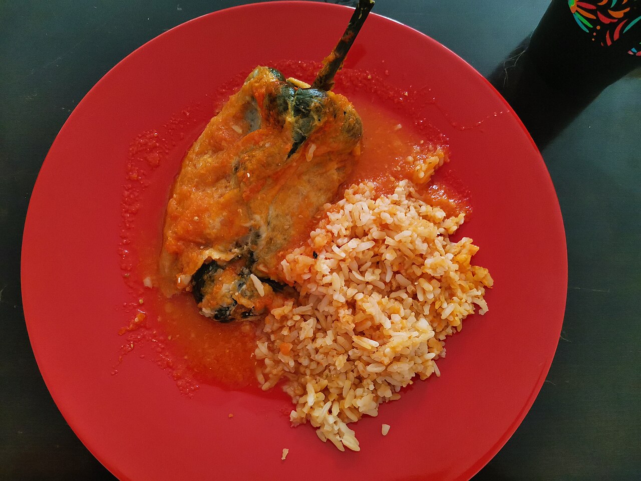 Illustrative chile relleno with rice photo; not a photo of Taqueria Mexico