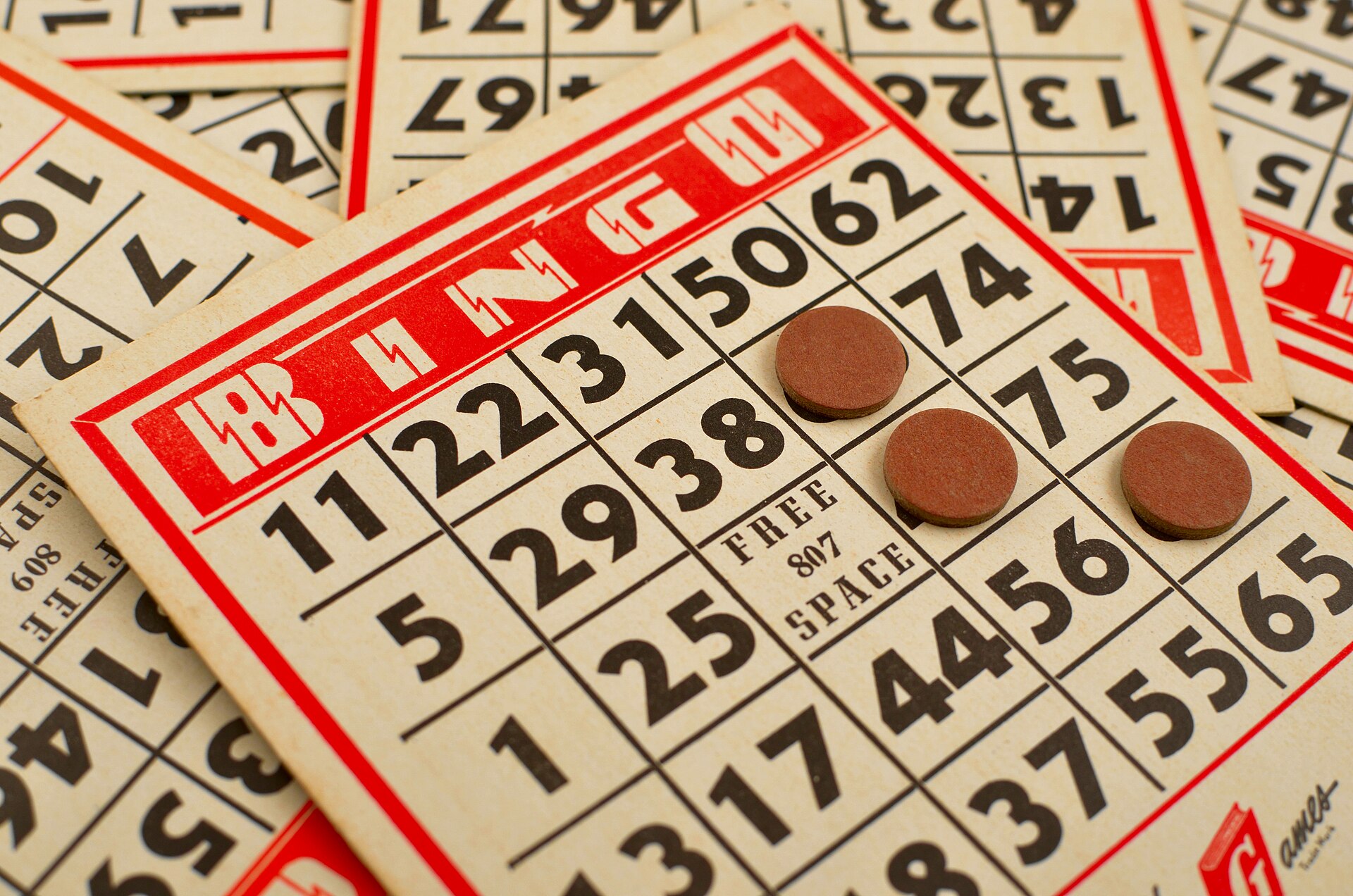 Illustrative photograph of bingo game cards and markers; not a photograph taken at Backyard Public House
