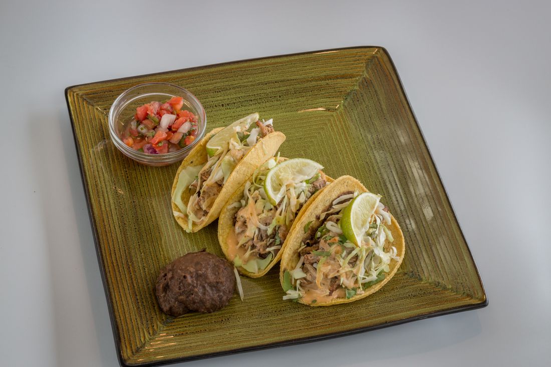 Illustrative fish tacos photograph — not a photograph from Ole' Mexican Grill